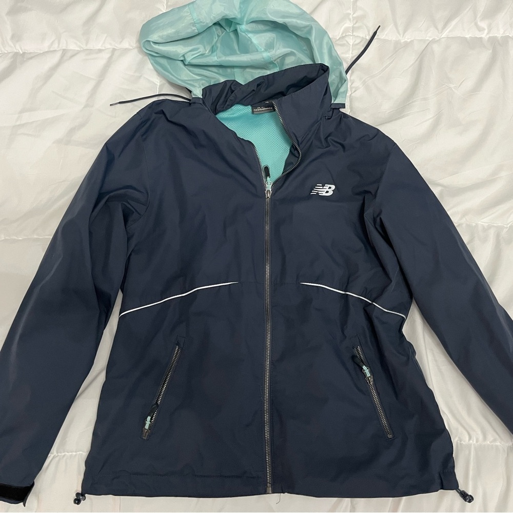 New Balance Women's Dark Blue Ski Jacket with Light Blue Details